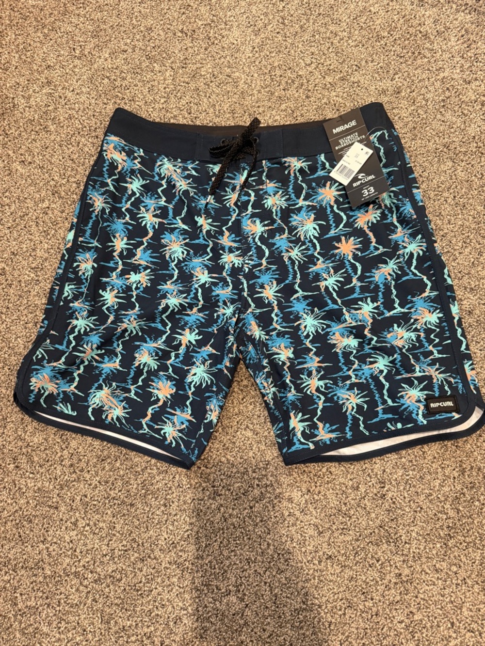 Rip Curl Navy Boardshorts with Aqua & Light Orange Palm Print size 33